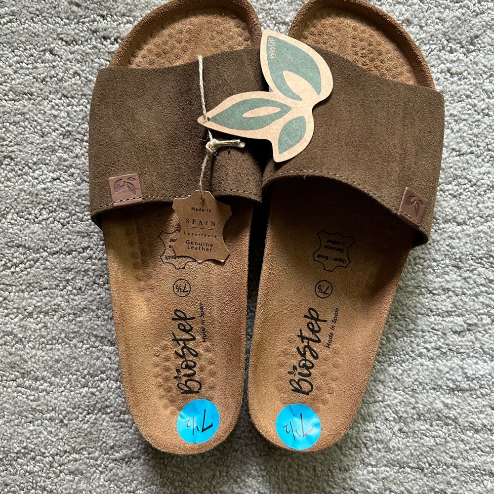 Ladies slides. Size 7.5. Never worn.